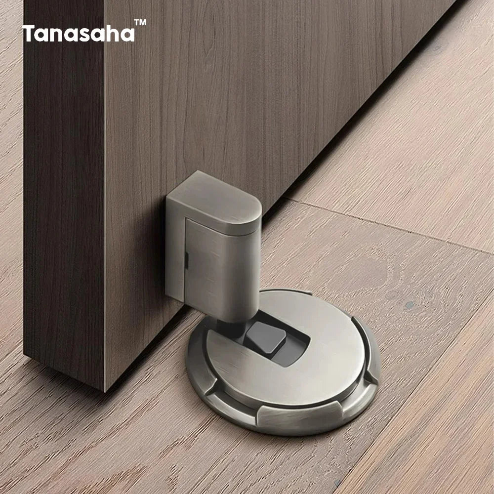 Non-punch automatic floor door stopper in gold, black, and grey colors installed under door