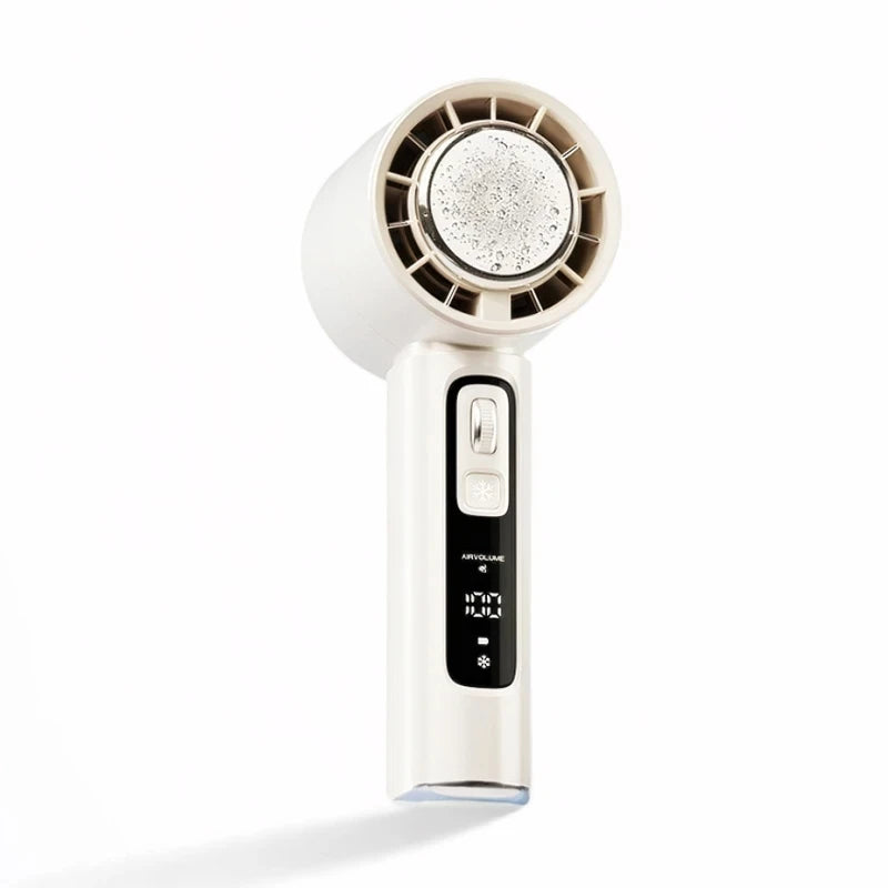 White handheld hair dryer with digital display on a white background. High-Speed Semiconductor Refrigeration Handheld Fan – 4000mAh USB Rechargeable Portable Outdoor Mini Fan