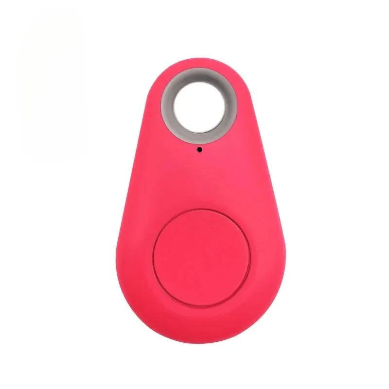 Red tracking device on a white background. Mini GPS Bluetooth 5.0 Tracker for Pets, Kids, Wallets & Bags - Smart Anti-Lost Round Device with App Control