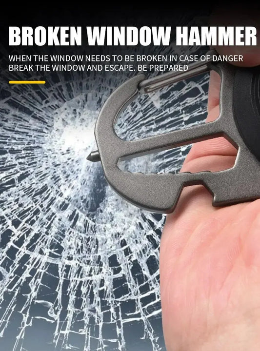 Broken window hammer with shattered glass background