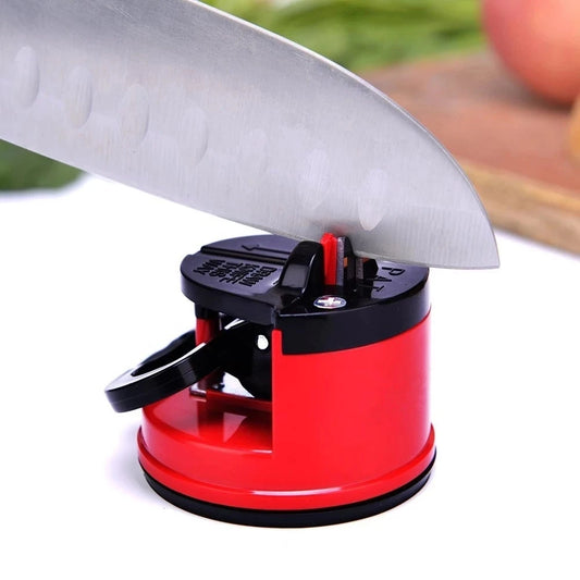 Manual suction knife sharpener with ABS plastic body and tungsten steel sharpening slot for kitchen and chef knives. LifeHack